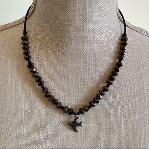 Bird charm necklace